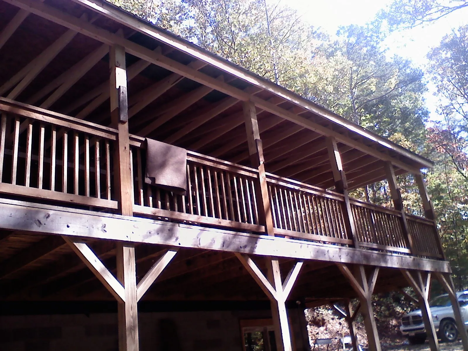 Timber framing under a new elevated porch and deck — Roof Leak Repair in Minnetonka by Roofing Brothers